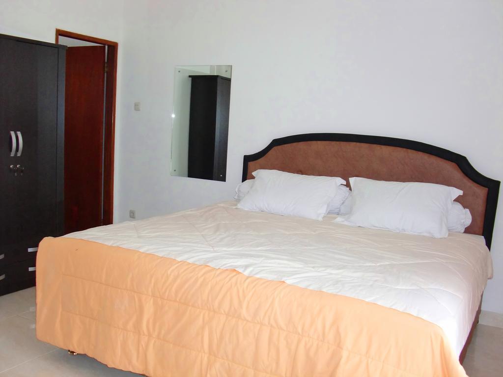 Libra Homestay Manado Quarto foto